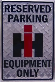 Reserved Parking "IH" Equipment Only (with IH in Red an Black)  on Diamond Plate